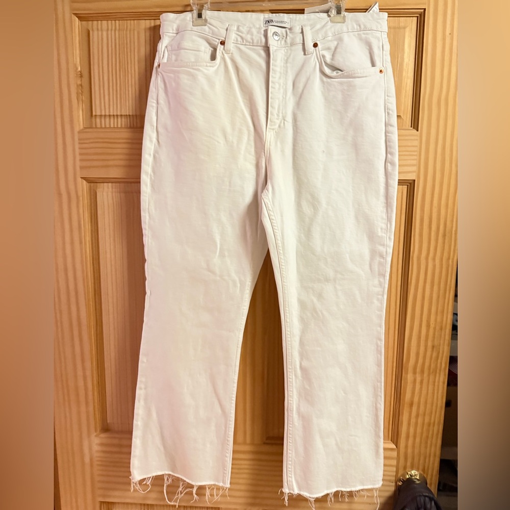 Mid Rise Crop Flare jeans with raw hem